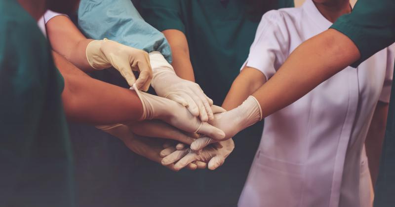 health-care workers solidarity huddle