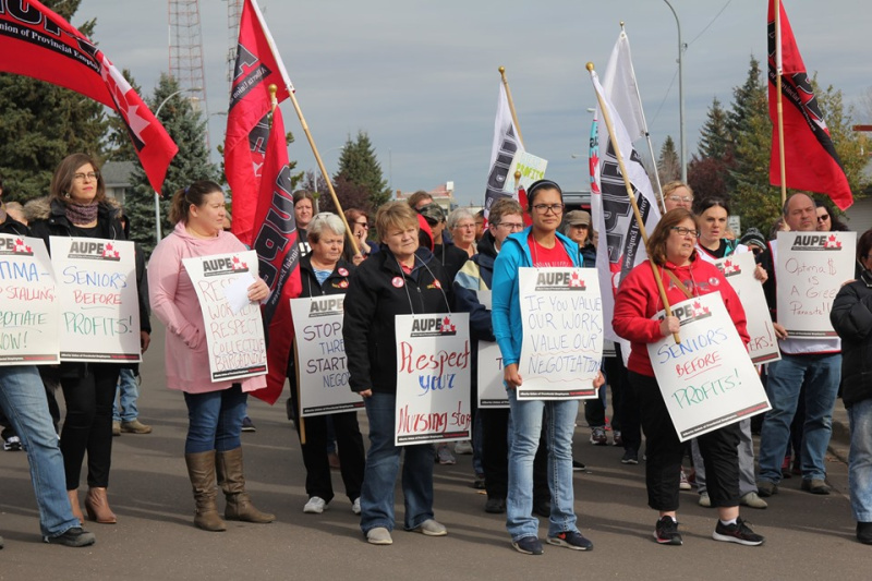 health-care workers rallying outside