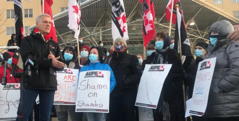 AUPE president Guy Smith speaks to a crowd of healthcare worker on a wildcat strike on October 26, 2020.