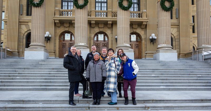 AUPE COPA members and VP James Gault in front of the Alberta Legislature.